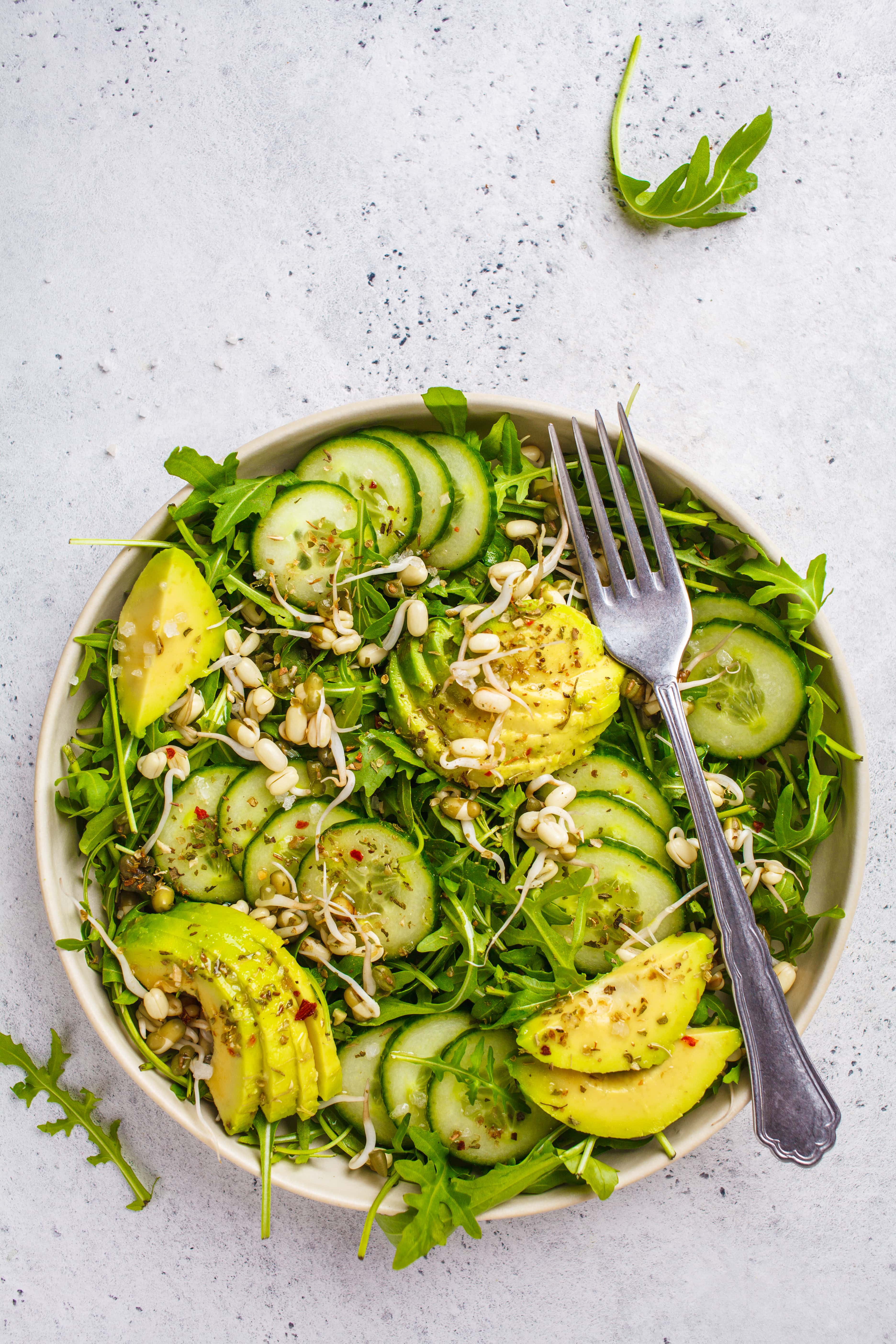 healthy green salad GREEN SALAD WITH AVOCADO, CUCUMBER, AND ARUGULA